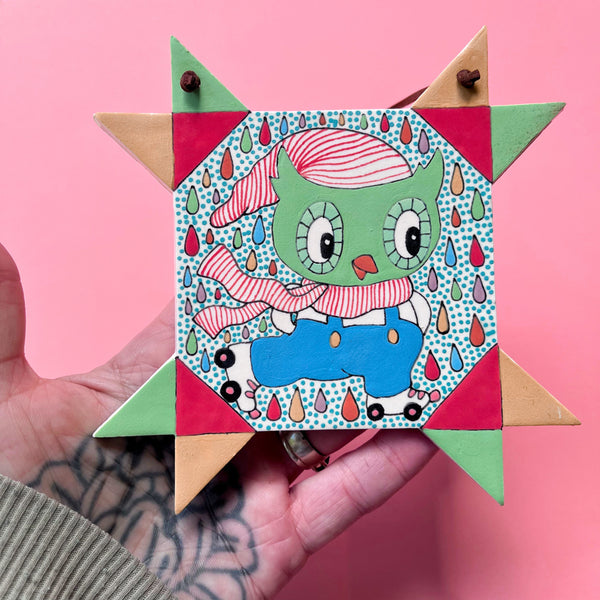 Ceramic Hand Built Owl Roller Skating Wall Hanging