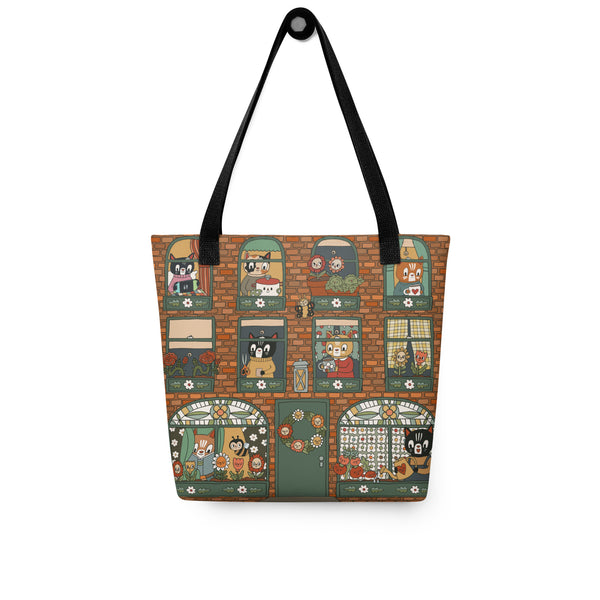 Tote bag with cartoon cats at an apartment pattern on a white background