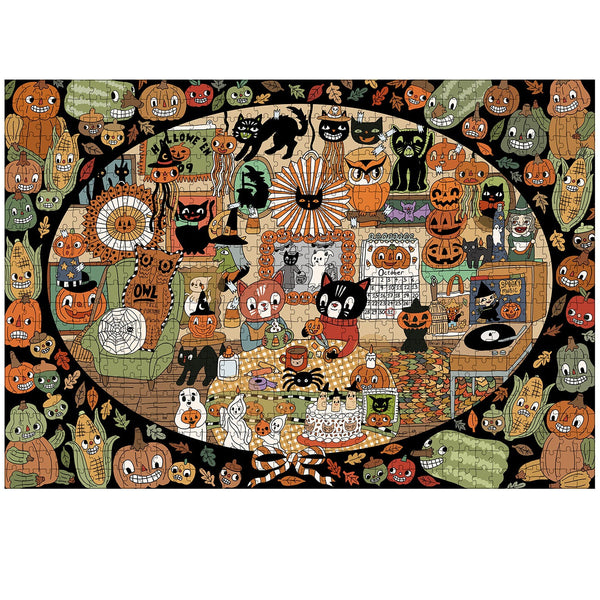 A Halloween-themed jigsaw puzzle featuring a dense collage of cartoon pumpkins, cats, spiderwebs, bats, ghosts, and autumn motifs inside an oval frame, surrounded by a black border with smiling jack-o'-lanterns and leaves.